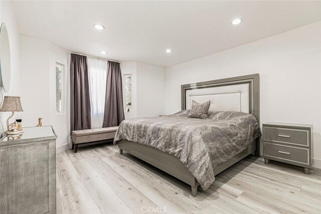 23500 Lloyd Houghton Pl, Newhall, CA 91321 - bedroom featuring wood finished floors and recessed lighting