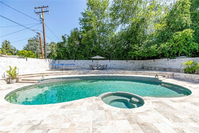 23500 Lloyd Houghton Pl, Newhall, CA 91321 - view of swimming pool featuring a patio, a fenced backyard, and a pool with connected hot tub