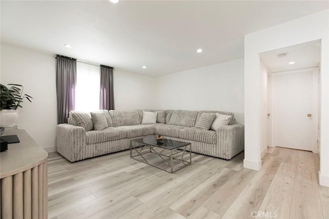 23500 Lloyd Houghton Pl, Newhall, CA 91321 - living room with recessed lighting and light wood-style flooring