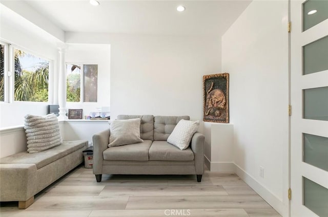 23500 Lloyd Houghton Pl, Newhall, CA 91321 - living area with recessed lighting and light wood-style floors