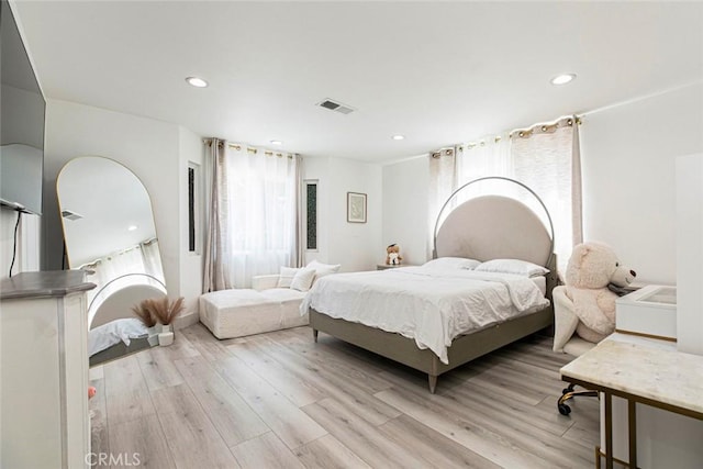 23500 Lloyd Houghton Pl, Newhall, CA 91321 - bedroom with light wood-style floors, multiple windows, and recessed lighting
