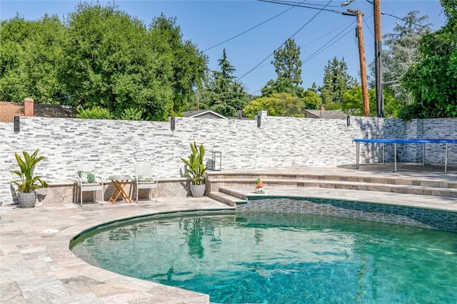 23500 Lloyd Houghton Pl, Newhall, CA 91321 - view of swimming pool featuring a fenced backyard and a patio