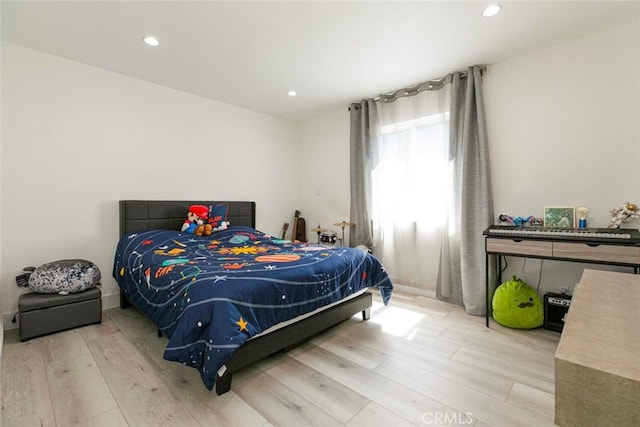 23500 Lloyd Houghton Pl, Newhall, CA 91321 - bedroom with wood finished floors and recessed lighting
