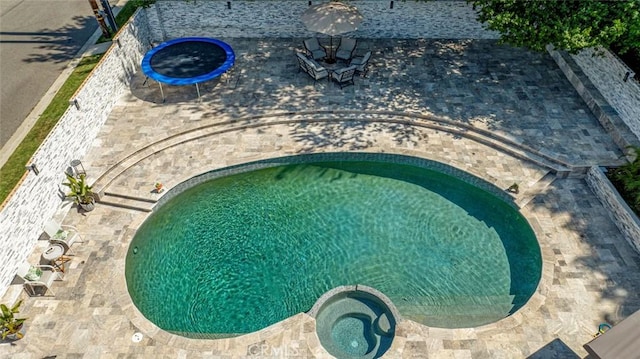23500 Lloyd Houghton Pl, Newhall, CA 91321 - view of swimming pool with a patio and a pool with connected hot tub