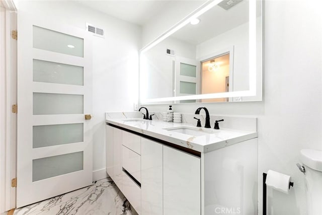 23500 Lloyd Houghton Pl, Newhall, CA 91321 - full bath featuring marble look tile flooring and double vanity
