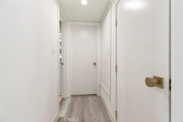 23500 Lloyd Houghton Pl, Newhall, CA 91321 - hall with light wood finished floors and recessed lighting