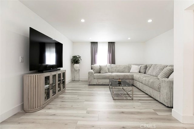 23500 Lloyd Houghton Pl, Newhall, CA 91321 - living room featuring wood finished floors and recessed lighting
