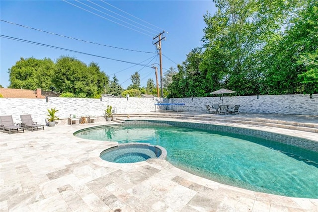 23500 Lloyd Houghton Pl, Newhall, CA 91321 - view of pool featuring a patio, a fenced backyard, and a pool with connected hot tub