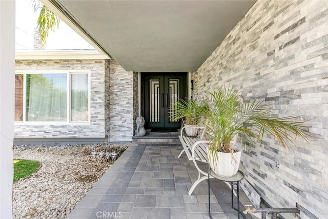 23500 Lloyd Houghton Pl, Newhall, CA 91321 - view of exterior entry with french doors and brick siding