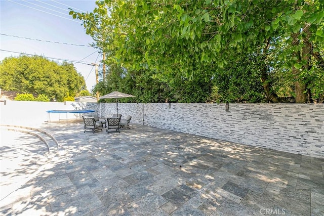 23500 Lloyd Houghton Pl, Newhall, CA 91321 - view of patio / terrace featuring a trampoline