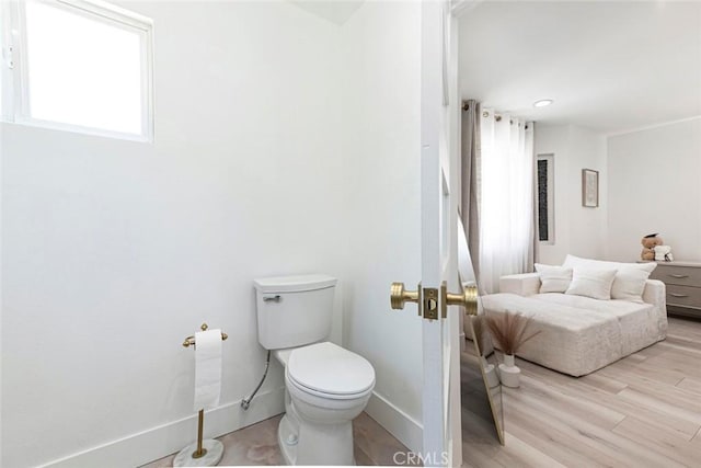 23500 Lloyd Houghton Pl, Newhall, CA 91321 - bathroom with toilet and wood finished floors
