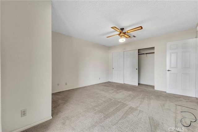 204 Hawk Ln, Palmdale, CA 93551 - unfurnished bedroom featuring carpet, a textured ceiling, a closet, and ceiling fan