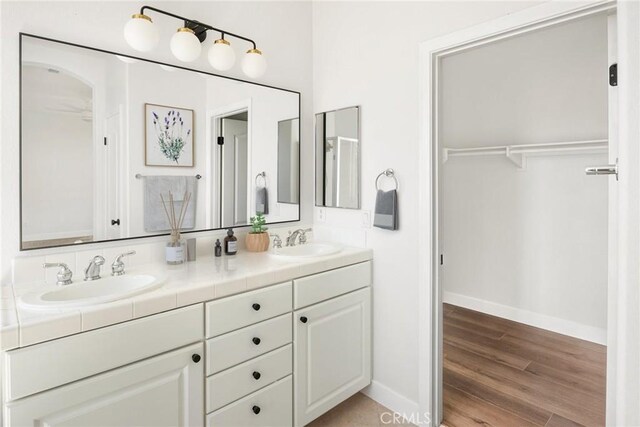 967 Strawberry Creek St, Chula Vista, CA 91913 - full bath featuring double vanity, wood finished floors, and a spacious closet