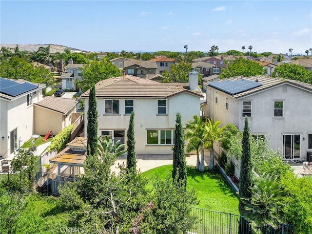967 Strawberry Creek St, Chula Vista, CA 91913 - back of property featuring a residential view, a fenced backyard, and stucco siding