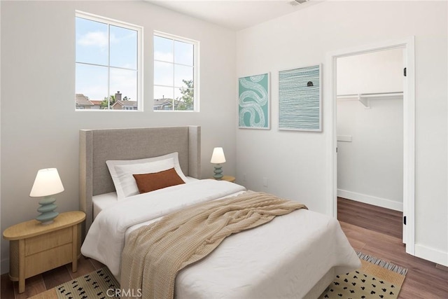 967 Strawberry Creek St, Chula Vista, CA 91913 - bedroom with wood finished floors, a spacious closet, and a closet