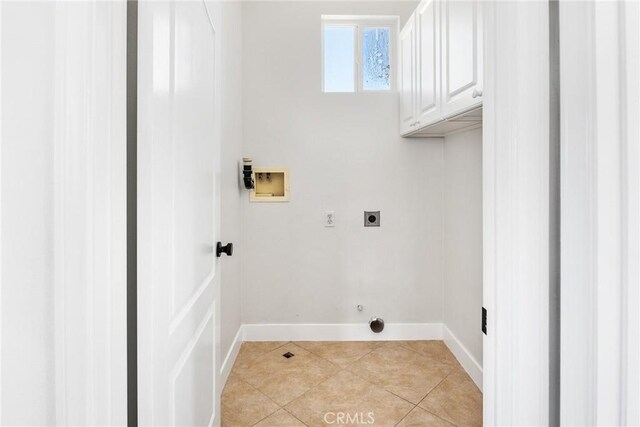 967 Strawberry Creek St, Chula Vista, CA 91913 - laundry area with electric dryer hookup, cabinet space, hookup for a washing machine, and light tile patterned floors