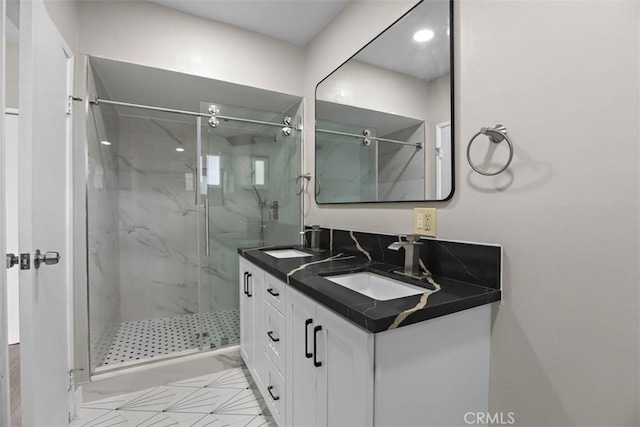 5021 Harbor St, Commerce, CA 90040 - full bathroom featuring a marble finish shower and double vanity