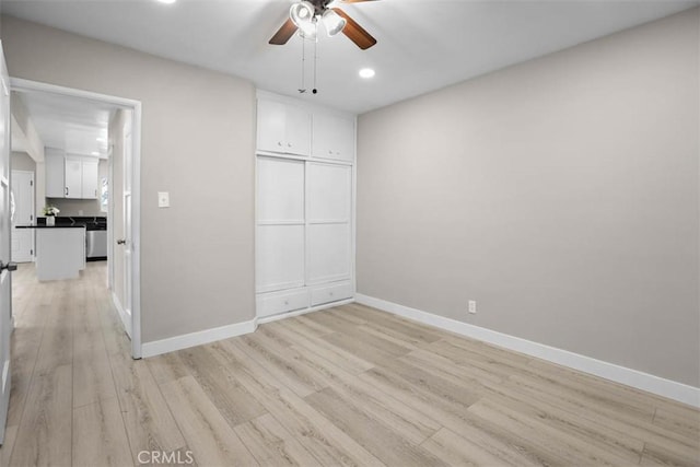 5021 Harbor St, Commerce, CA 90040 - unfurnished bedroom with light wood finished floors, recessed lighting, a ceiling fan, and a closet