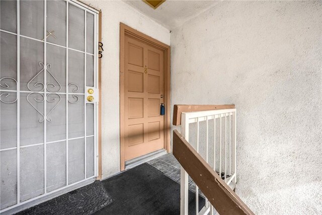 2521 W Sunflower Ave Unit R8, Santa Ana, CA 92704 - doorway to property with stucco siding