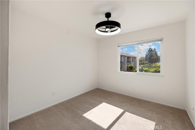 2521 W Sunflower Ave Unit R8, Santa Ana, CA 92704 - empty room with carpet flooring and baseboards