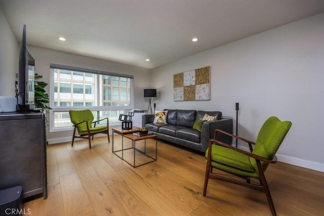 5585 E Pacific Coast Unit 141, Long Beach, CA 90804 - living area with light wood-style floors and recessed lighting