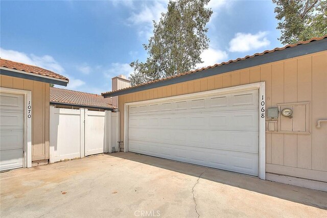 1068 Border Ave, Corona, CA 92882 - garage featuring concrete driveway