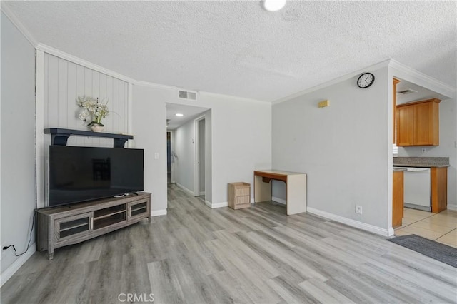 1657 E Kingsley Ave Unit B, Pomona, CA 91767 - unfurnished living room with ornamental molding, light wood-style flooring, and a textured ceiling