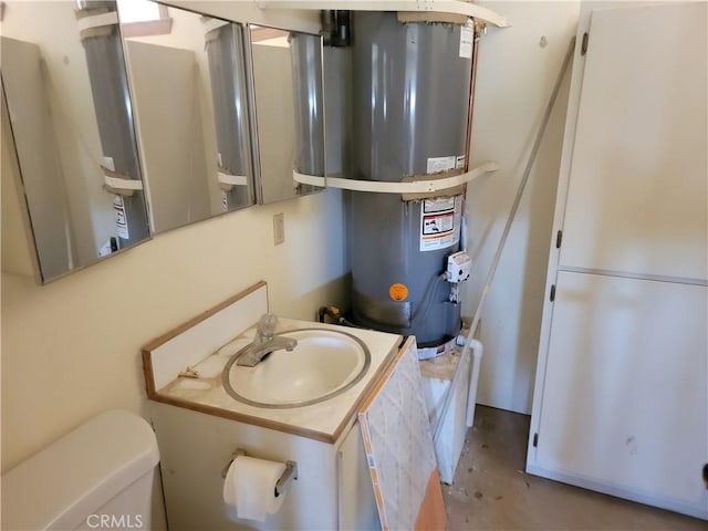 15440 Cactus St, Hesperia, CA 92345 - half bathroom featuring strapped water heater and vanity