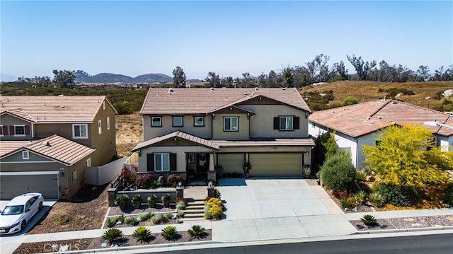 28667 Clearview St, Murrieta, CA 92563 - traditional-style home with driveway, an attached garage, a residential view, and stucco siding