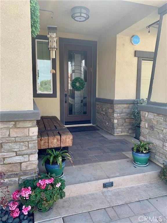 28667 Clearview St, Murrieta, CA 92563 - entrance to property with stone siding and stucco siding