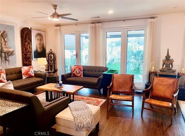 28667 Clearview St, Murrieta, CA 92563 - living area with wood finished floors, healthy amount of natural light, and a ceiling fan