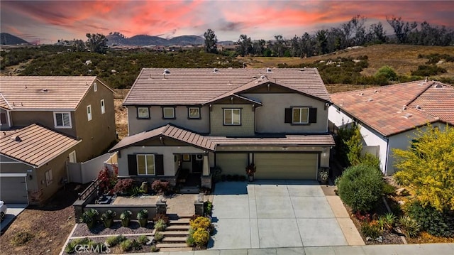 28667 Clearview St, Murrieta, CA 92563 - traditional-style home with an attached garage, concrete driveway, stucco siding, and a tile roof
