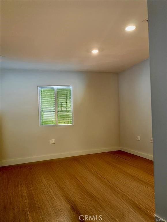 28667 Clearview St, Murrieta, CA 92563 - spare room featuring recessed lighting and wood finished floors