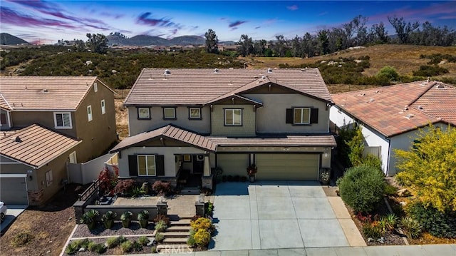 28667 Clearview St, Murrieta, CA 92563 - traditional home with a garage, driveway, stucco siding, and a tile roof