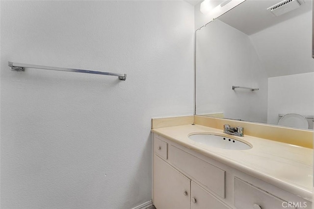 1553 Dennis Pl, West Covina, CA 91790 - bathroom with vanity and vaulted ceiling