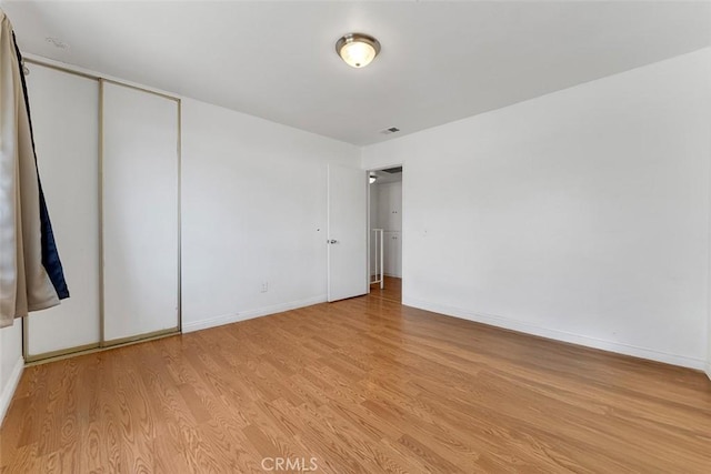 1553 Dennis Pl, West Covina, CA 91790 - unfurnished bedroom featuring light wood-style flooring and a closet