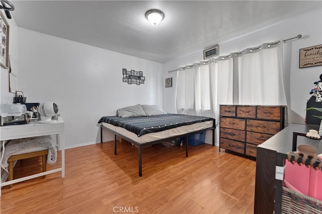 1553 Dennis Pl, West Covina, CA 91790 - bedroom featuring light wood-type flooring and an office area