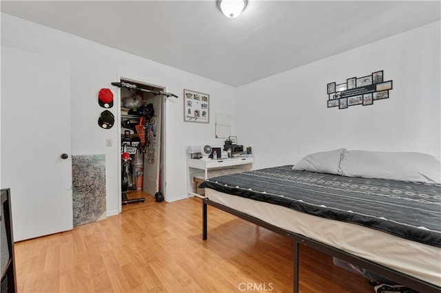 1553 Dennis Pl, West Covina, CA 91790 - bedroom featuring light wood-style flooring and a walk in closet