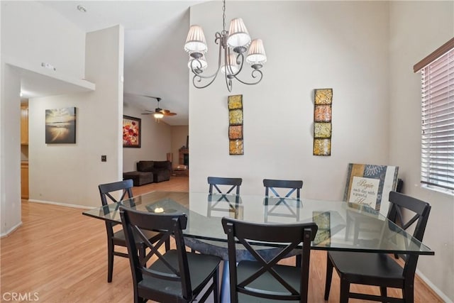 12671 Shorewood Ln, Victorville, CA 92392 - dining room with light wood-type flooring, ceiling fan, and a chandelier