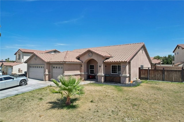 12671 Shorewood Ln, Victorville, CA 92392 - view of front of home featuring stucco siding, an attached garage, a tile roof, and driveway