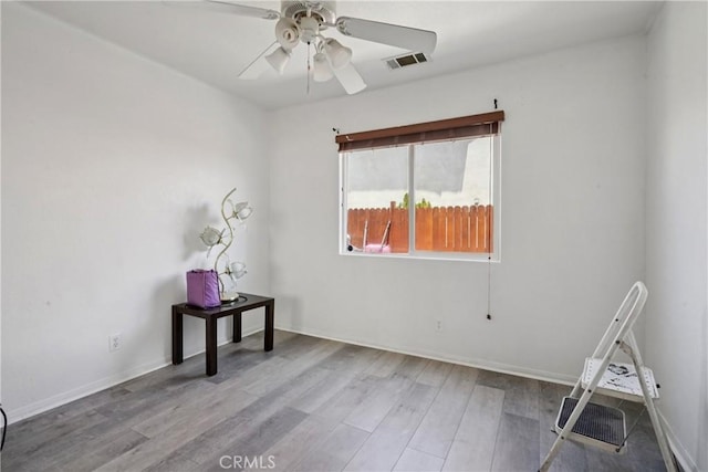 12671 Shorewood Ln, Victorville, CA 92392 - unfurnished room featuring ceiling fan and wood finished floors