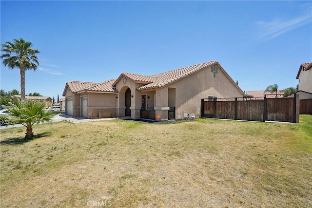 12671 Shorewood Ln, Victorville, CA 92392 - back of property featuring stucco siding, a garage, and a tiled roof