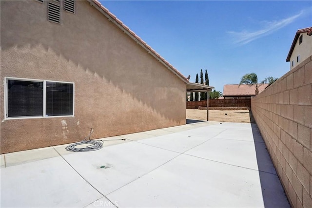 12671 Shorewood Ln, Victorville, CA 92392 - fenced backyard featuring a patio