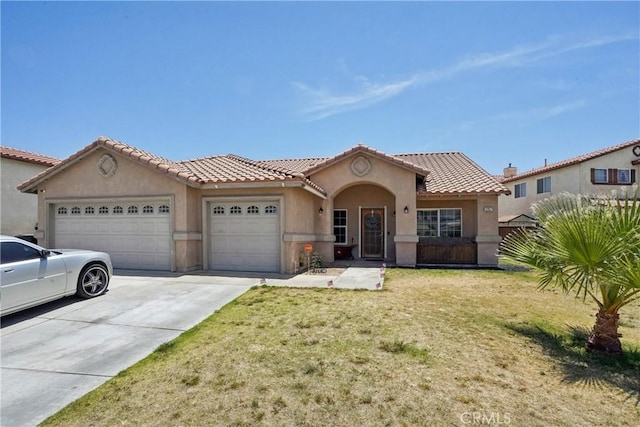 12671 Shorewood Ln, Victorville, CA 92392 - mediterranean / spanish-style house featuring an attached garage, stucco siding, concrete driveway, a front lawn, and a tiled roof