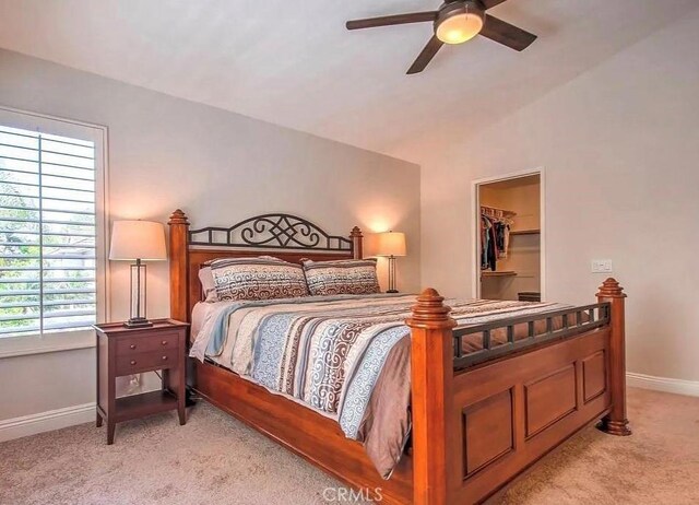 15 Parisville, Aliso Viejo, CA 92656 - bedroom with light carpet, a spacious closet, and a ceiling fan