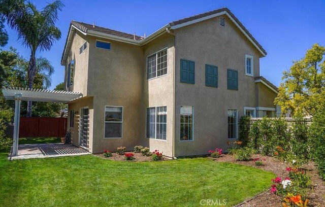 15 Parisville, Aliso Viejo, CA 92656 - back of property with a patio, a pergola, and stucco siding
