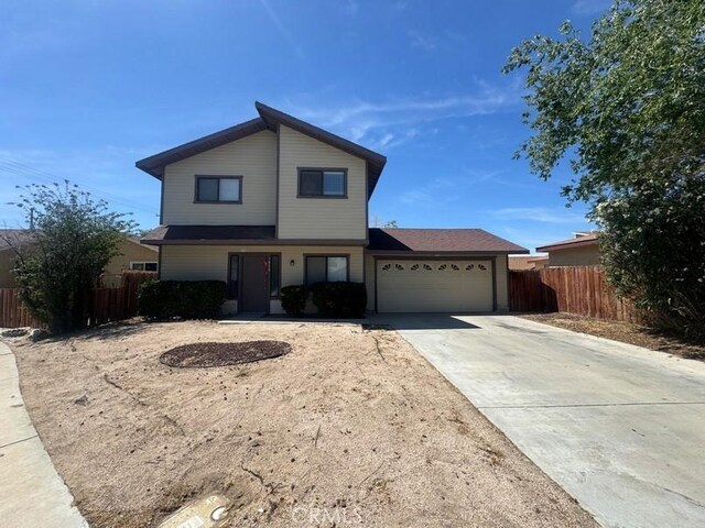 1848 Horizon Ln, Lancaster, CA 93535 - view of front of house featuring an attached garage and concrete driveway