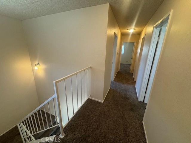 1848 Horizon Ln, Lancaster, CA 93535 - hall featuring an upstairs landing, carpet flooring, and a textured ceiling