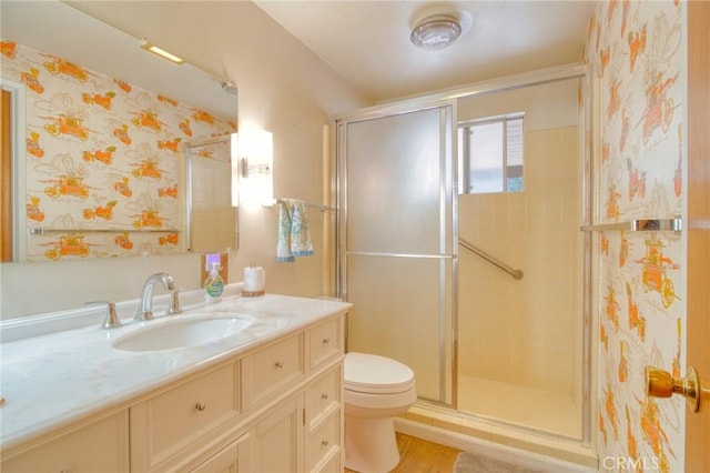 960 Snowbird Rd, Wrightwood, CA 92397 - full bathroom with vanity, a shower stall, and wood finished floors