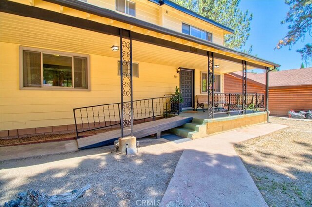 960 Snowbird Rd, Wrightwood, CA 92397 - doorway to property with a porch